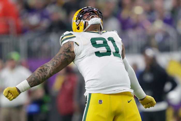 Green Bay linebacker Preston Smith celebrates a play against the Minnesota Vikings.